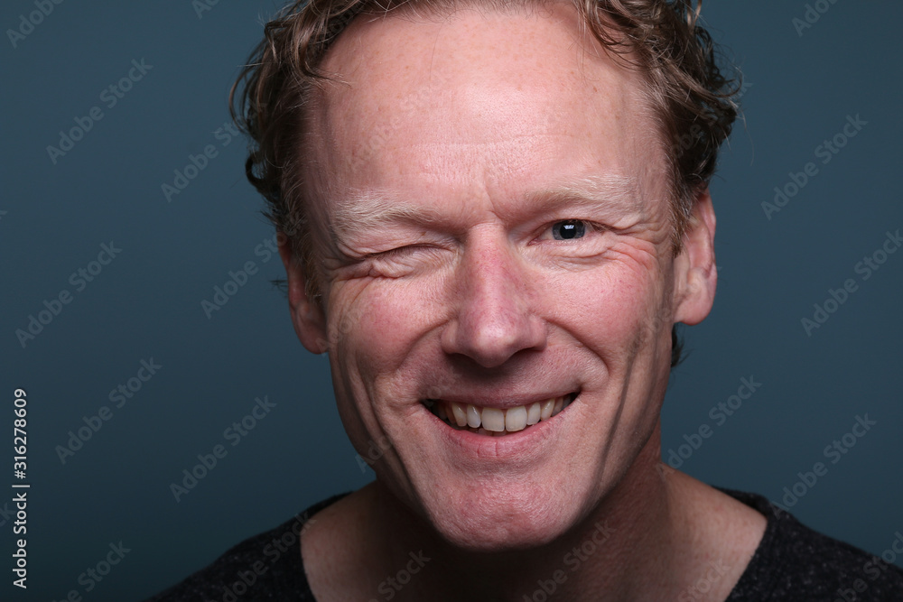 Beautiful man in front of a background Beautiful man in front of a background