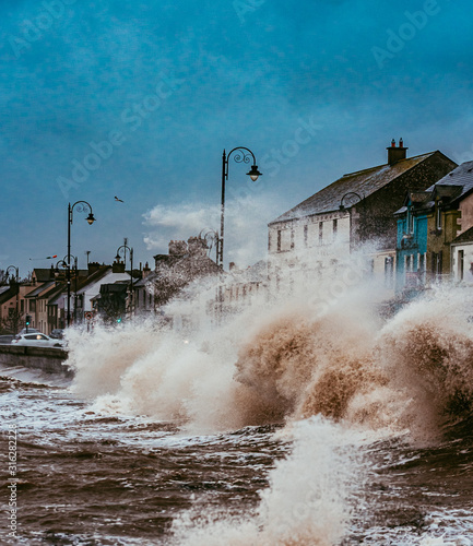 Storm Brendan hits Ireland. Photo taken in Blackrock Villag, Co Louth 13th January 2020..Dark sky, heavy rain and huge powerfull waves lash over the sea.