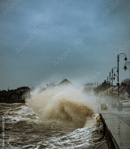 Storm Brendan hits Ireland. Photo taken in Blackrock Villag, Co Louth 13th January 2020..Dark sky, heavy rain and huge powerfull waves lash over the sea. photo