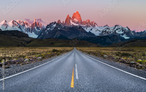 Beautiful Alpine Glow / first light on Mount Fitz Roy viewed from Road to El Chalten photo
