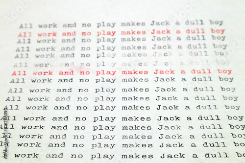 ALL WORK AND NO PLAY MAKES JACK A DULL BOY page of paper typed with an old vintage Typewriter