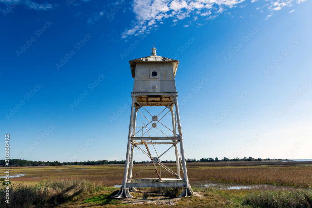 Close up of range beacon seen on a beautiful sunny day near the lighthouse on Sapelo Island, Georgia, USA.
