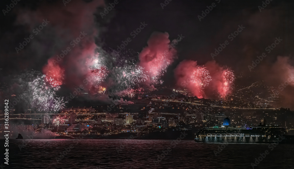 Fireworks show on New Year's Eve night in Funschal Madeira - obrazy, fototapety, plakaty 