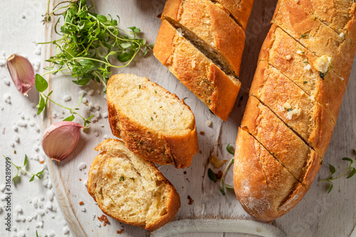 Canvas Print Fresh and aromatic garlic bread with thyme and salt