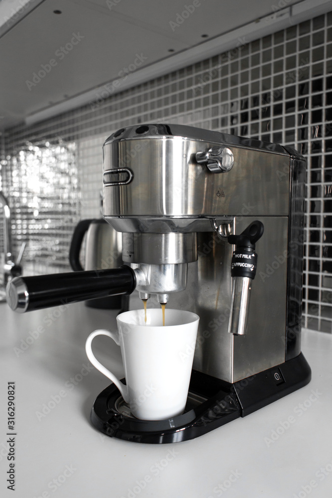 Close-up of making coffee in a coffee machine. Close-up of making coffee in a coffee machine.