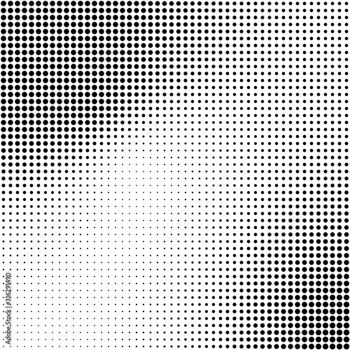 Abstract halftone background in black and white. Dotted vector pattern