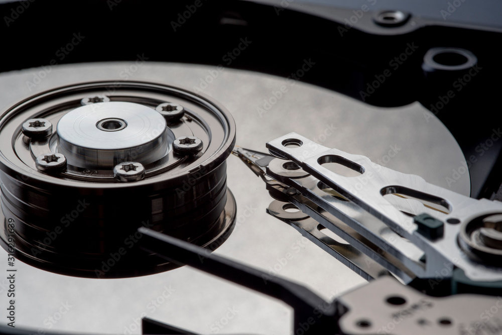 Closeup of an open computer hard drive. Closeup of an open computer hard drive.