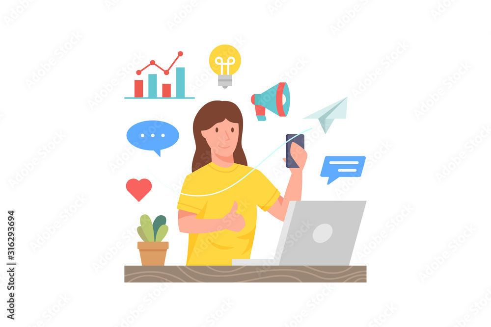 Woman holding smartphone in front of laptop Woman holding smartphone in front of laptop