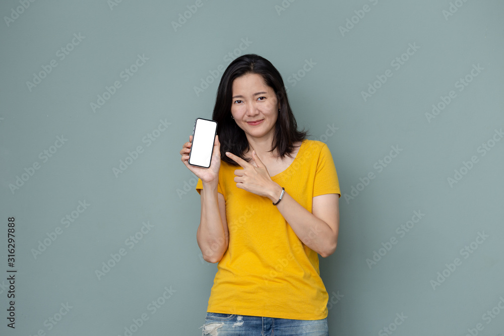 Mockup image blank white screen cell phone.woman hand holding texting using mobile.background empty space for advertise text.people contact marketing business,technology Mockup image blank white screen cell phone.woman hand holding texting using mobile.background empty space for advertise text.people contact marketing business,technology