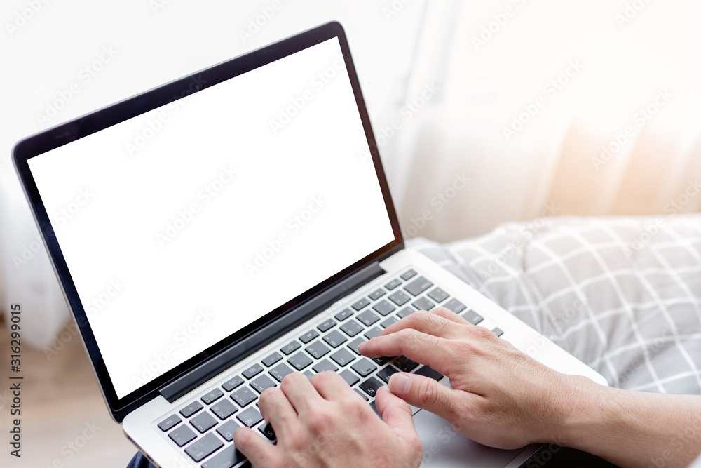 mockup image blank screen computer with white background for advertising text,hand woman using laptop contact business search information on desk at coffee shop.marketing and creative design mockup image blank screen computer with white background for advertising text,hand woman using laptop contact business search information on desk at coffee shop.marketing and creative design