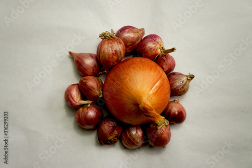 a collection of onions and shallots