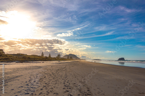 The long beach and Mount Manganui at the end