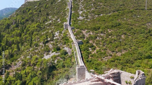 Aerial view of Mali Ston (Little Ston), known for saltworks and Great Wall, located on Pljesac peninsula in Croatia. photo