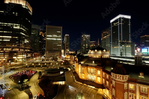 famous railway station in Tokyo at night. perspective and wide angle