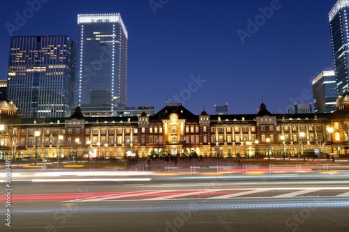 cars passing by famous railway station in Tokyo at night. long exposure