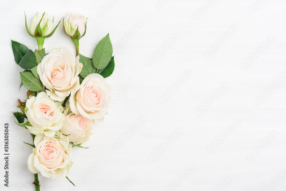 Beautiful white roses bouquet on white background with copy space