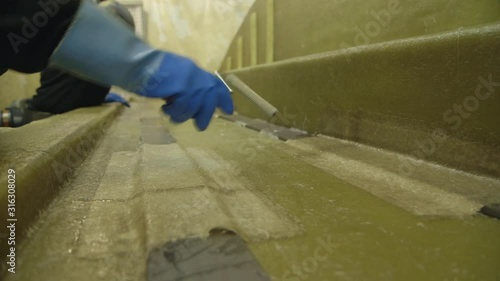 Wallpaper Mural Fiber glass molding  workers with masks - boat parts factory of off shore life boats - Norway Torontodigital.ca