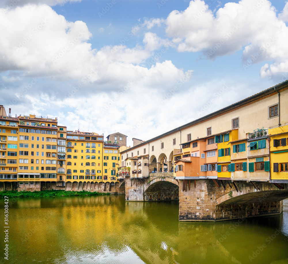 Colorful Florence buildings on the water canal