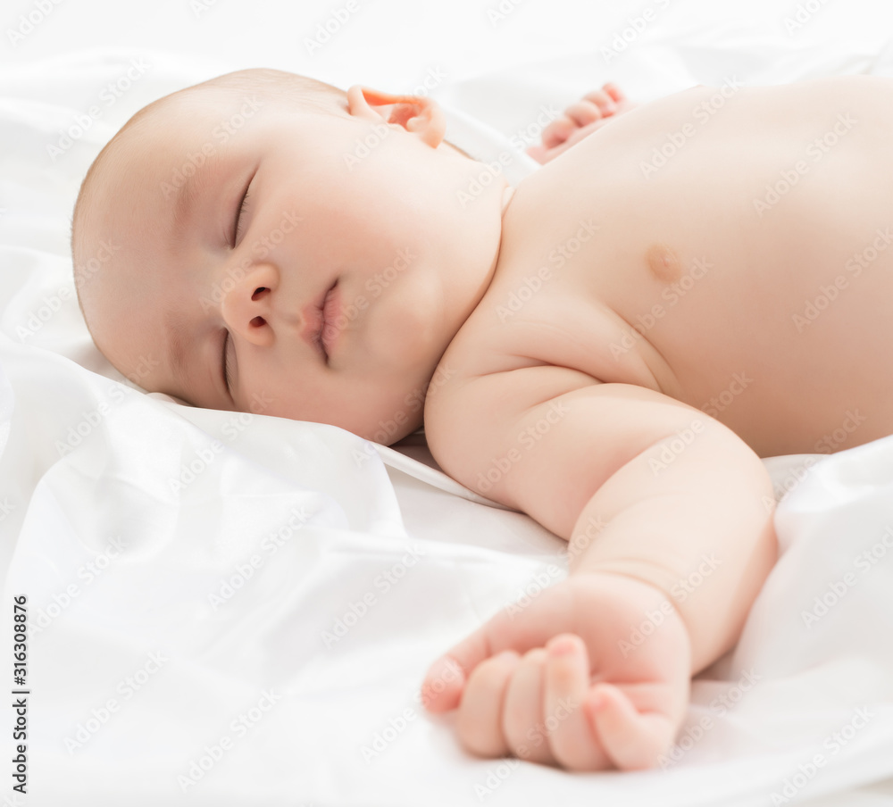 Childcare. Studio photo of adorable baby sleeping