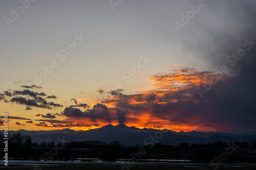 Twin Mountain Peaks Orange Sky Sunset Rays