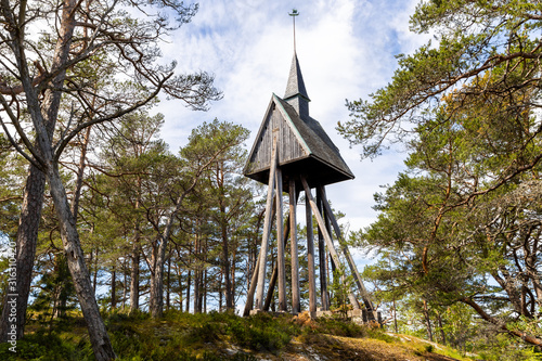 The wooden clock tower from 1930s at Sandhamn  chapel in Stockholm archipelago. photo