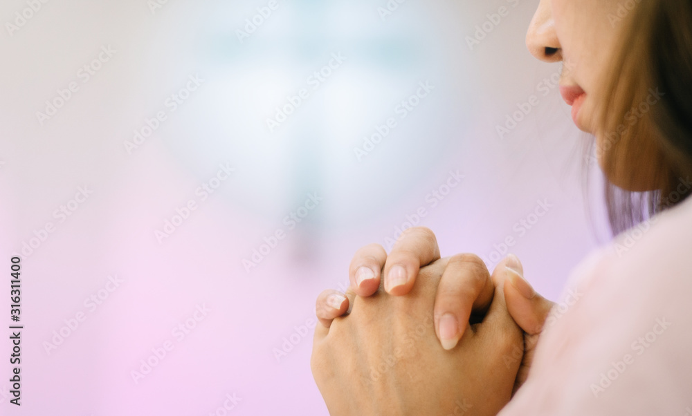 Beautiful asia woman praying inside a church to god blessing to wishing have a better life. Beautiful asia woman praying inside a church to god blessing to wishing have a better life.