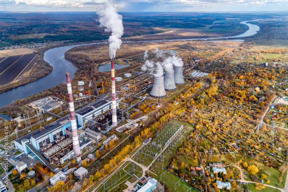 State District Power Station generating heat and electricity. High pipes and cooling towers are visible. Aerial view.