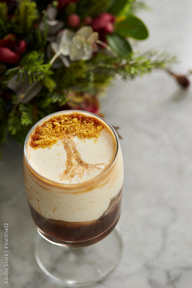 Coffee dessert, tree design on cream Coffee dessert, tree design on cream