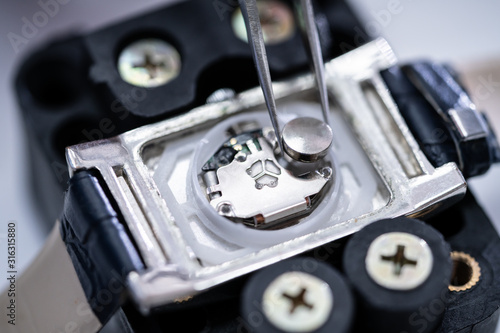 Wallpaper Mural Tweezers With Battery And Wrist Watch Torontodigital.ca