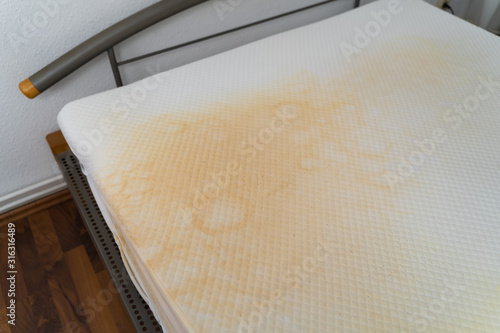 Dirty Mattress With Yellow Stains