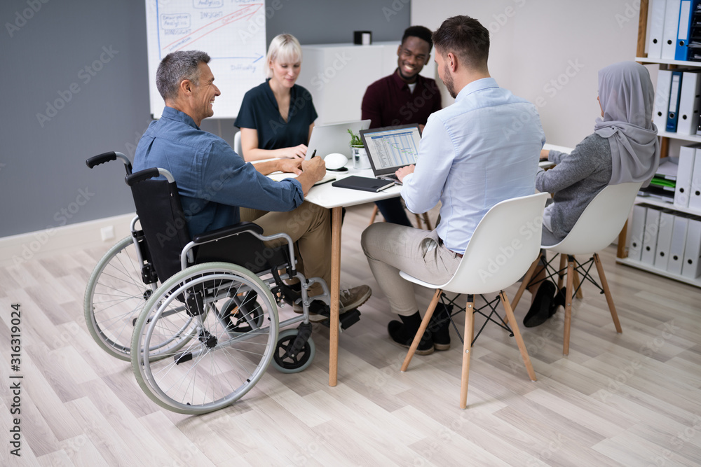 Disabled Businessman In Conference Room - obrazy, fototapety, plakaty 
