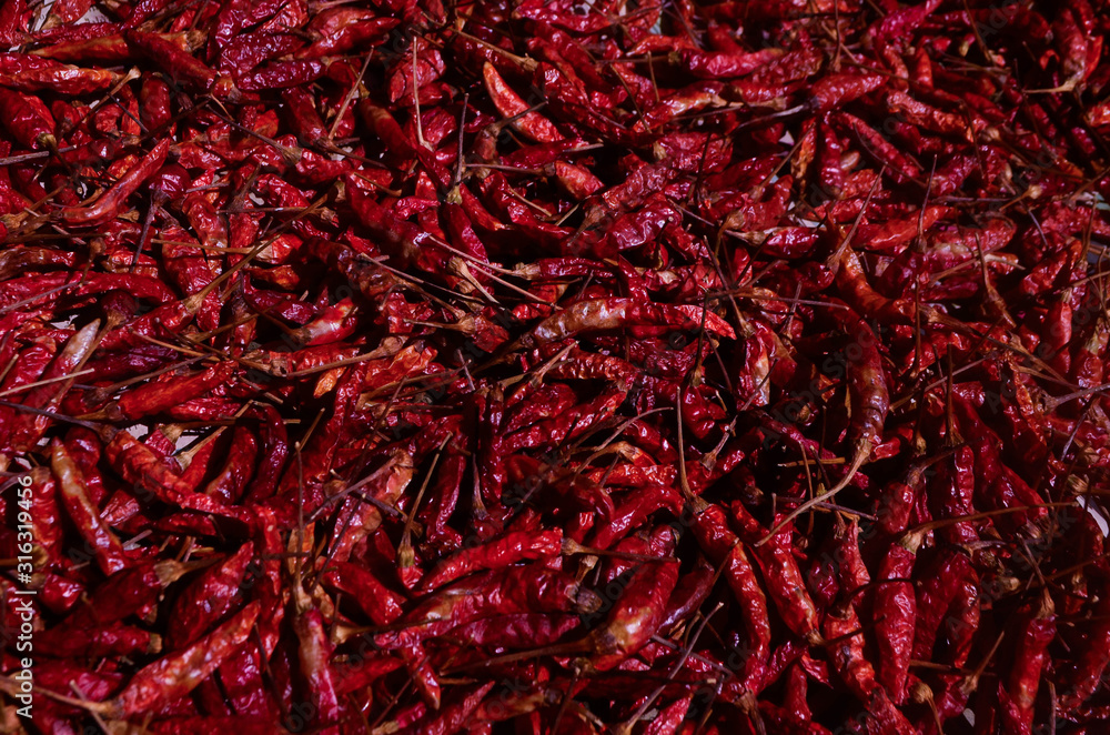 Fototapeta premium dried red hot chili peppers background