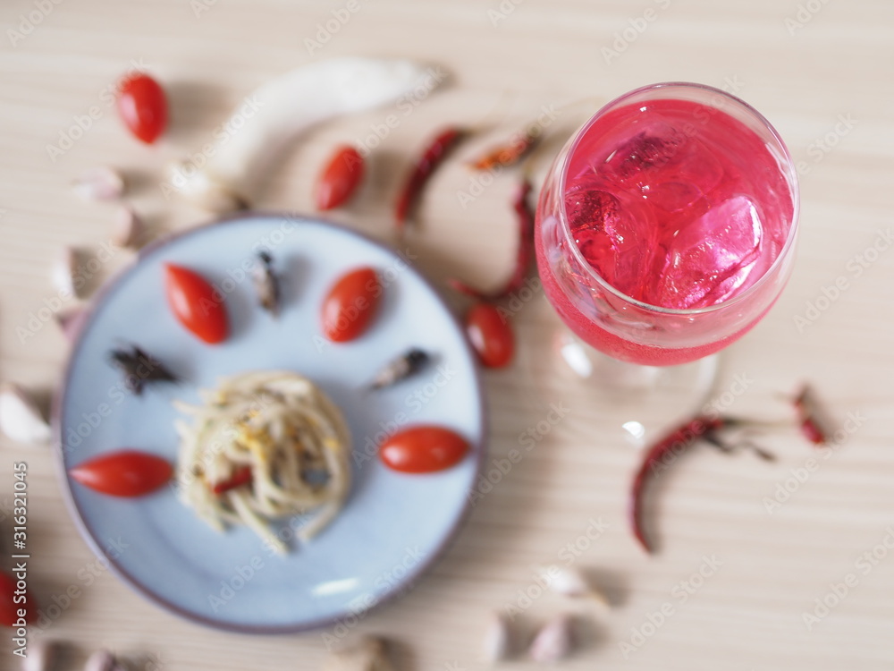 Cricket fried appetizer eat with raspberry cold beverage Cricket fried appetizer eat with raspberry cold beverage