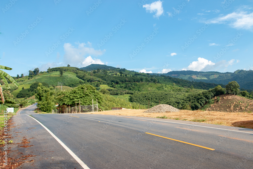 Curved asphalt road on the mountain, Travel concept Curved asphalt road on the mountain, Travel concept