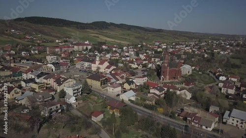Wallpaper Mural Panorama from a bird's eye view. Central Europe: The Polish town of Kolaczyce is located among the green hills. Temperate climate. Flight drones or quadrocopter. Torontodigital.ca