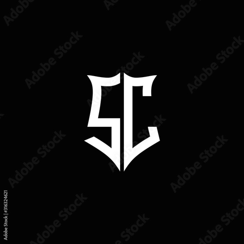 SC monogram letter logo ribbon with shield style isolated on black background