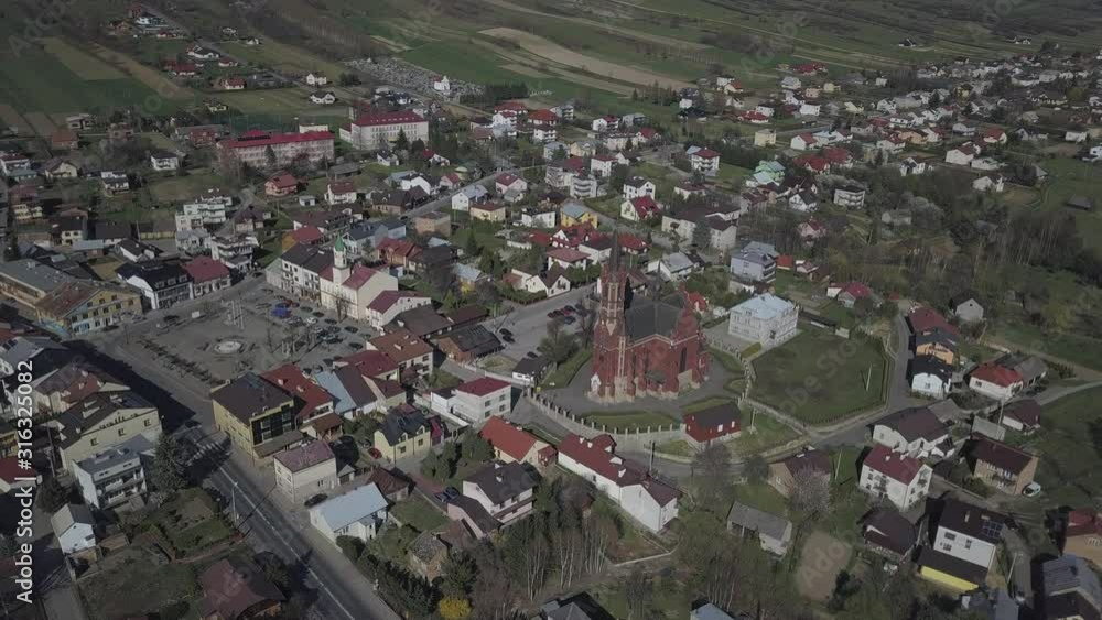 Panorama from a bird's eye view. Central Europe: The Polish town of Kolaczyce is located among the green hills. Temperate climate. Flight drones or quadrocopter. Panorama from a bird's eye view. Central Europe: The Polish town of Kolaczyce is located among the green hills. Temperate climate. Flight drones or quadrocopter.