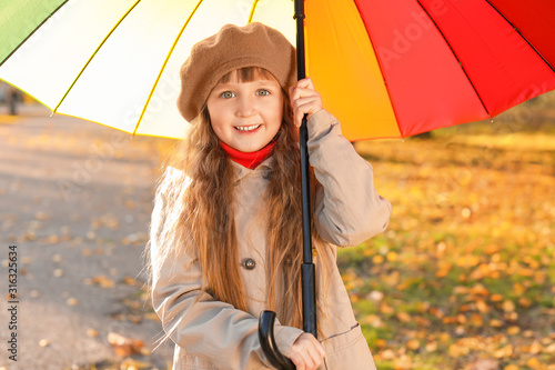 Cute little girl with umbre...