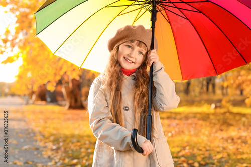 Cute little girl with umbre...