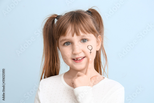 Little girl with symbol of ...