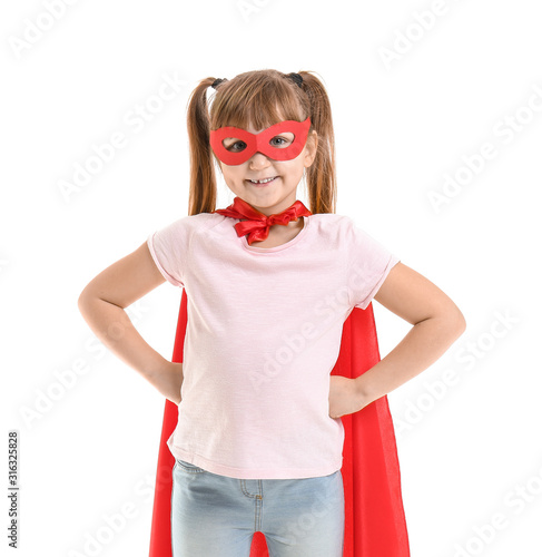Little girl in superhero co...