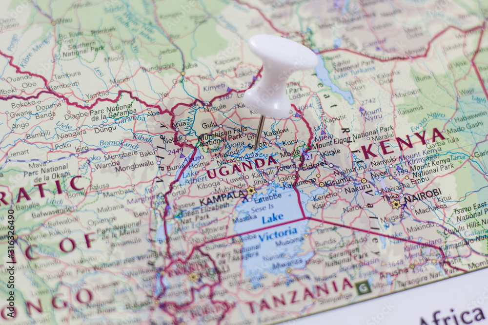 Uganda on the map of the world. Stock Photo | Adobe Stock