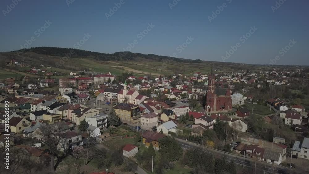 Panorama from a bird's eye view. Central Europe: The Polish town of Kolaczyce is located among the green hills. Temperate climate. Flight drones or quadrocopter. Panorama from a bird's eye view. Central Europe: The Polish town of Kolaczyce is located among the green hills. Temperate climate. Flight drones or quadrocopter.