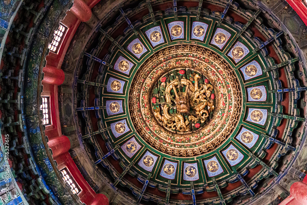 Ceiling of Forbidden City, with decoration of a golden dragon and dragon ball