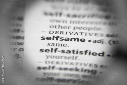Word or phrase selfsame in a dictionary. photo