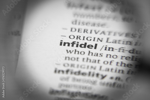 Valokuva Word or phrase infidel in a dictionary.