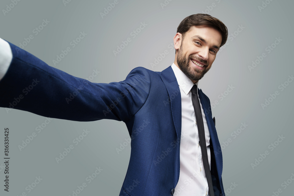 wide angle selfie shot of young handsome stylish businessman wearing suit wide angle selfie shot of young handsome stylish businessman wearing suit