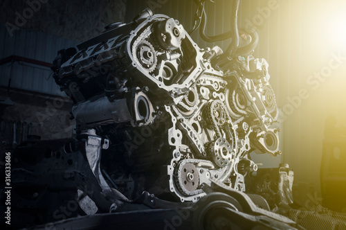 New automotive set timing chain in engine auto repair shop