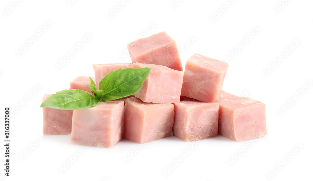 Cubes of tasty fresh ham with basil isolated on white Cubes of tasty fresh ham with basil isolated on white