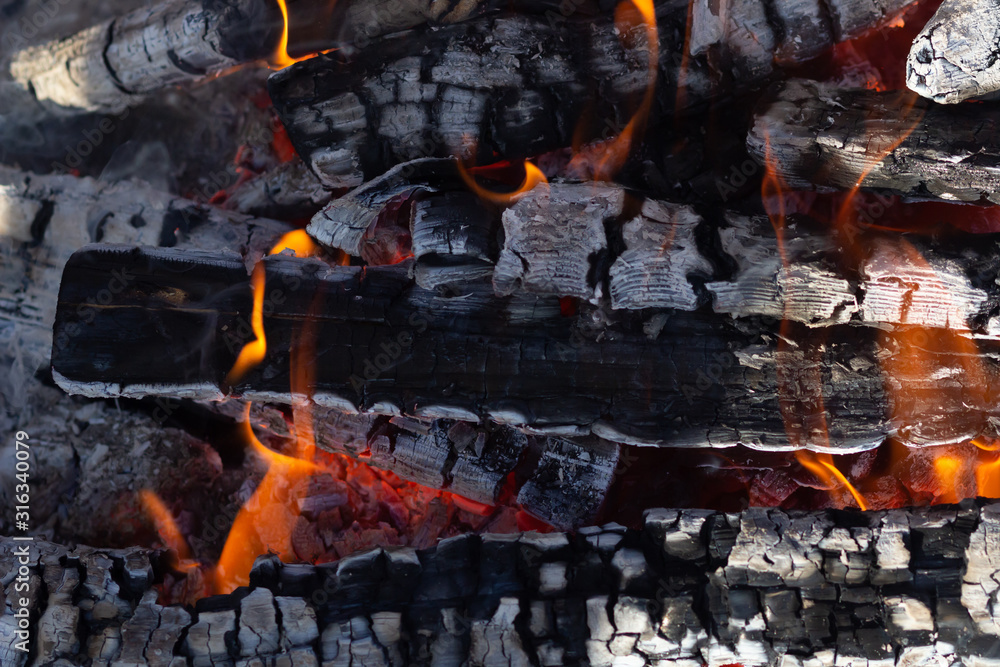 Glowing Hot Charcoal In BBQ Grill Pit With Flames Background Texture, Close-up Glowing Hot Charcoal In BBQ Grill Pit With Flames Background Texture, Close-up